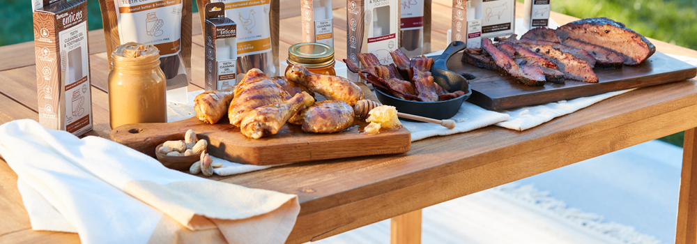 Enticers dental cater line on a table with Barbecue wings and barbecue chicken.