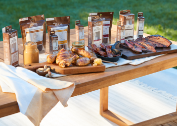 Enticers dental cater line on a table with Barbecue wings and barbecue chicken.