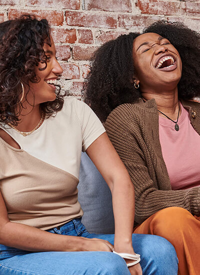 Two young people smiling